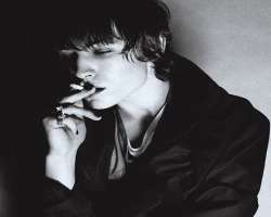 Ezra Miller smoking